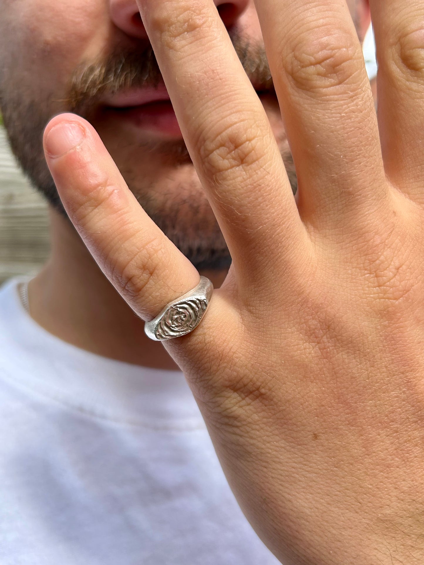 the smaller sketched swirl ring