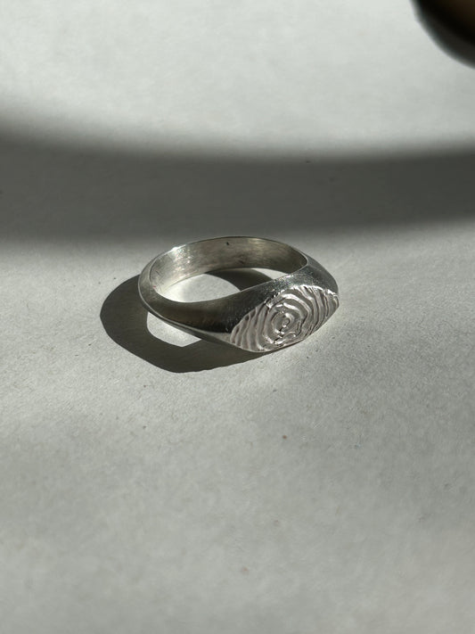 the smaller sketched swirl ring