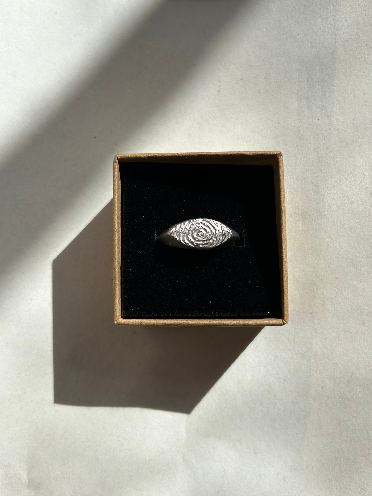 the smaller sketched swirl ring