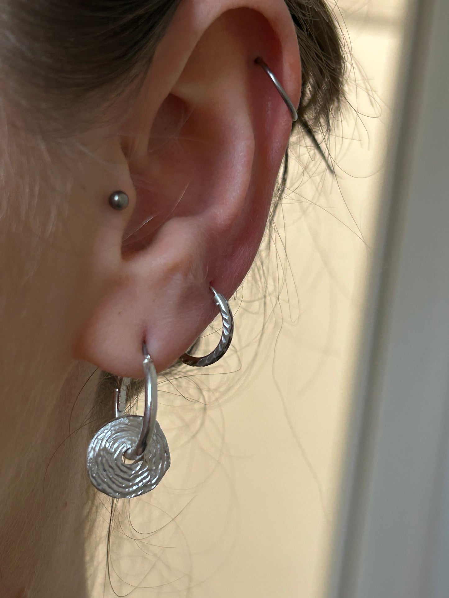the sketched swirl earrings