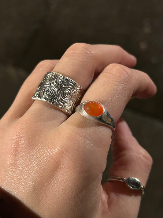 the really swirly big ring