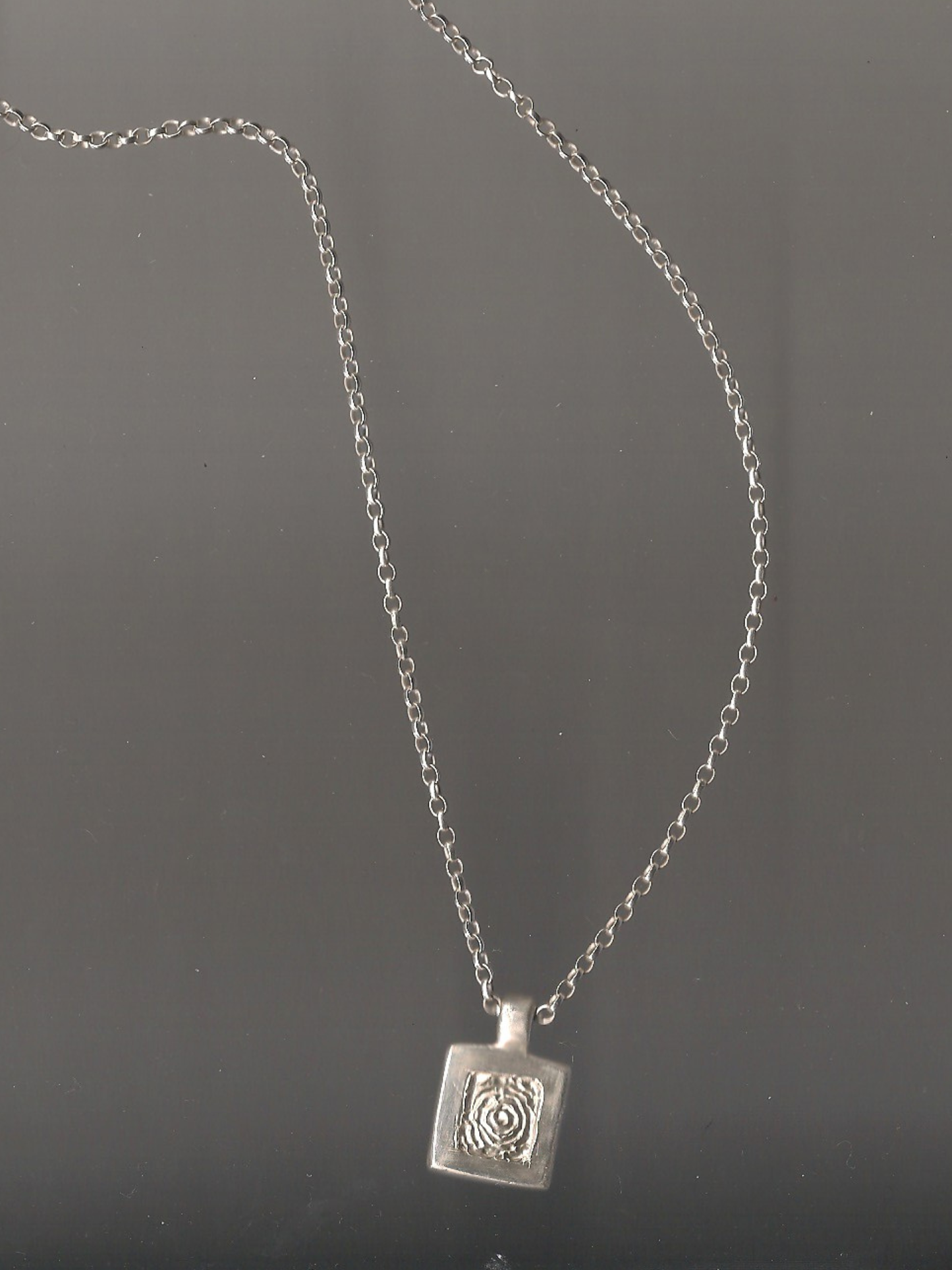 the square swirl necklace