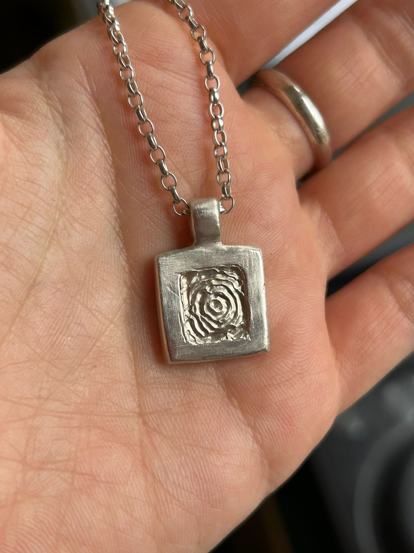 the square swirl necklace